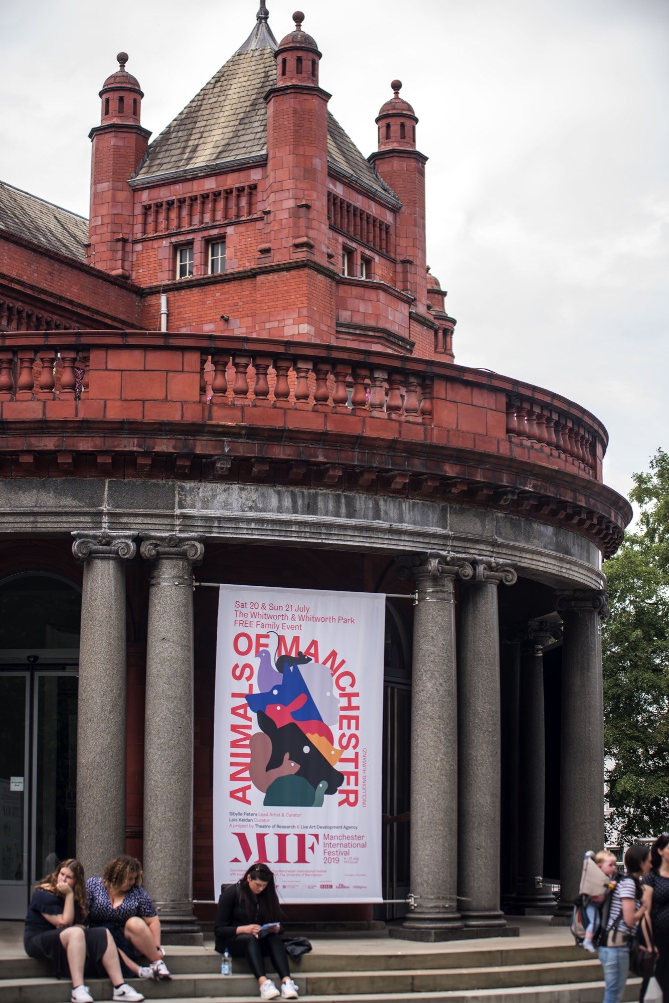 manchester whitworth gallery with animals of manchester sign