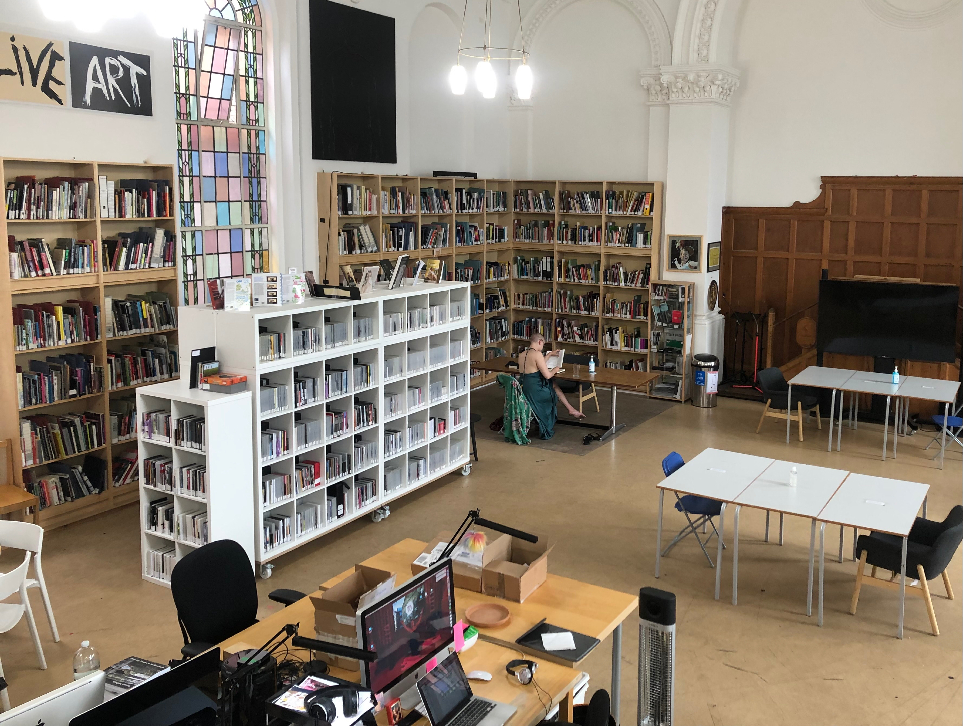 Photo of the Study Room, a hall with lots of bookcases and desks.