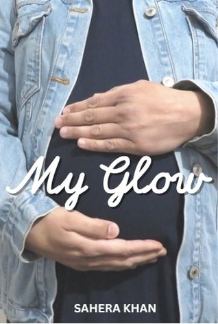 A photo of the torso of a pregnant brown woman. She is wearing a black blouse and a jean jacket, and has placed both her hands on her belly. ‘My Glow’ is written on a white calligraphy font over the photo.